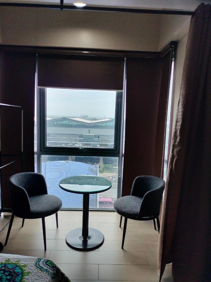 Condotel Near Airport At Two Palmtree Villas 马尼拉 外观 照片